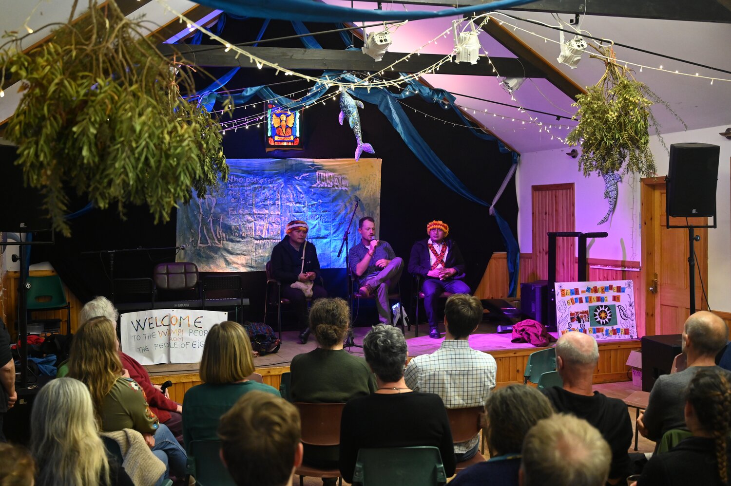Pamuk Teófilo and Tsanim speak to residents during the Land Justice community gathering. Credit: Jake Randall, FPP 