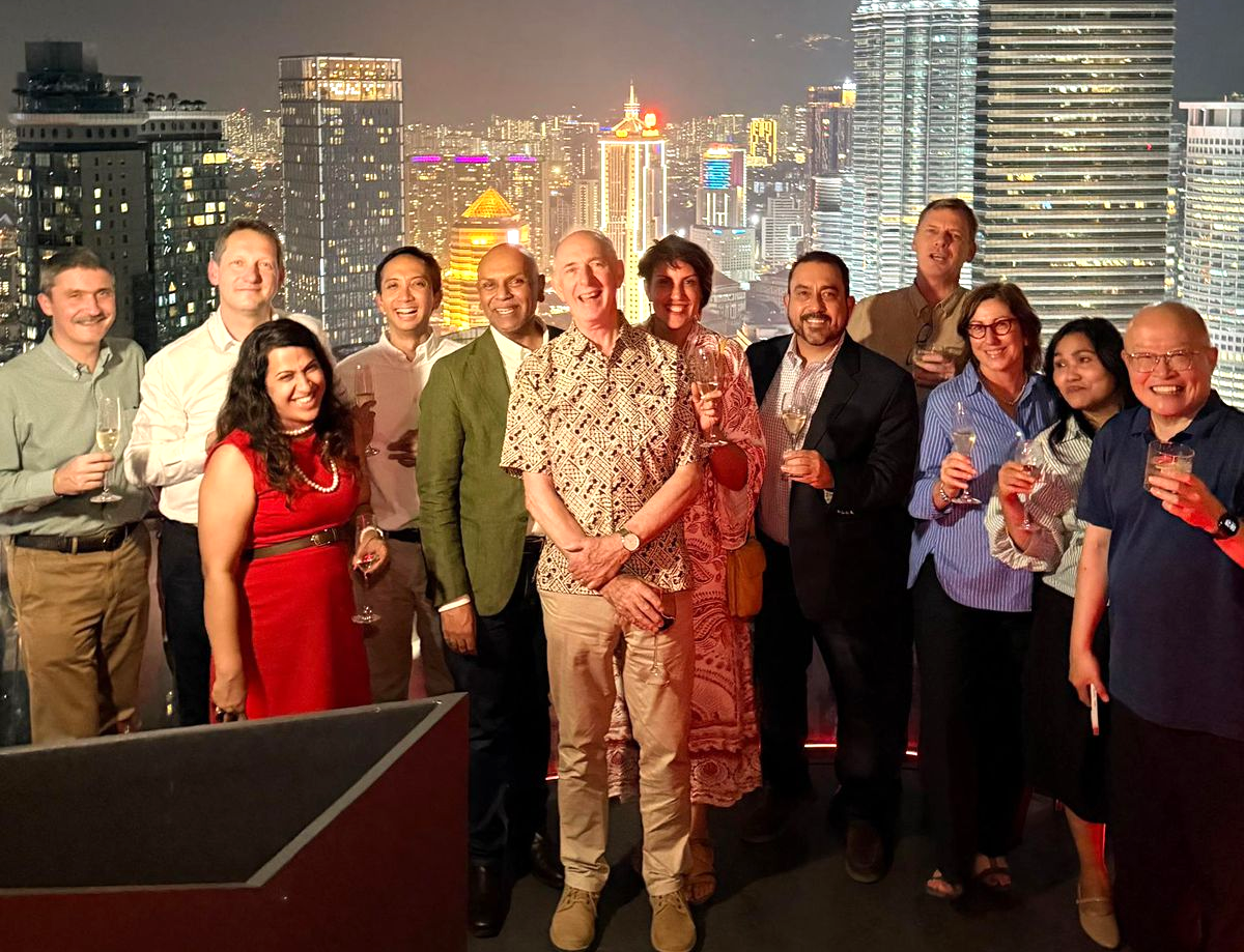 Group of people in front of skyline