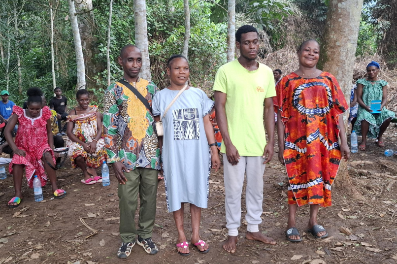 People stood in a line in a forest