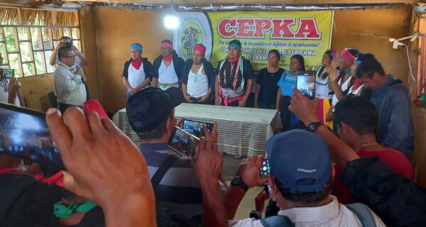 People stood in front of banner with words CEPKA