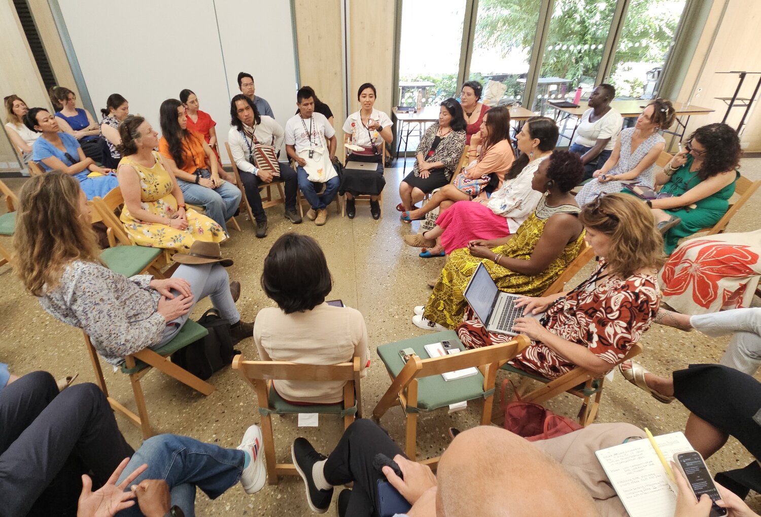 A group of people in a circle talking